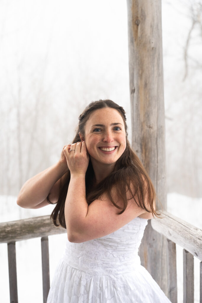 Outdoorsy getting ready photos for winter elopement in Maine