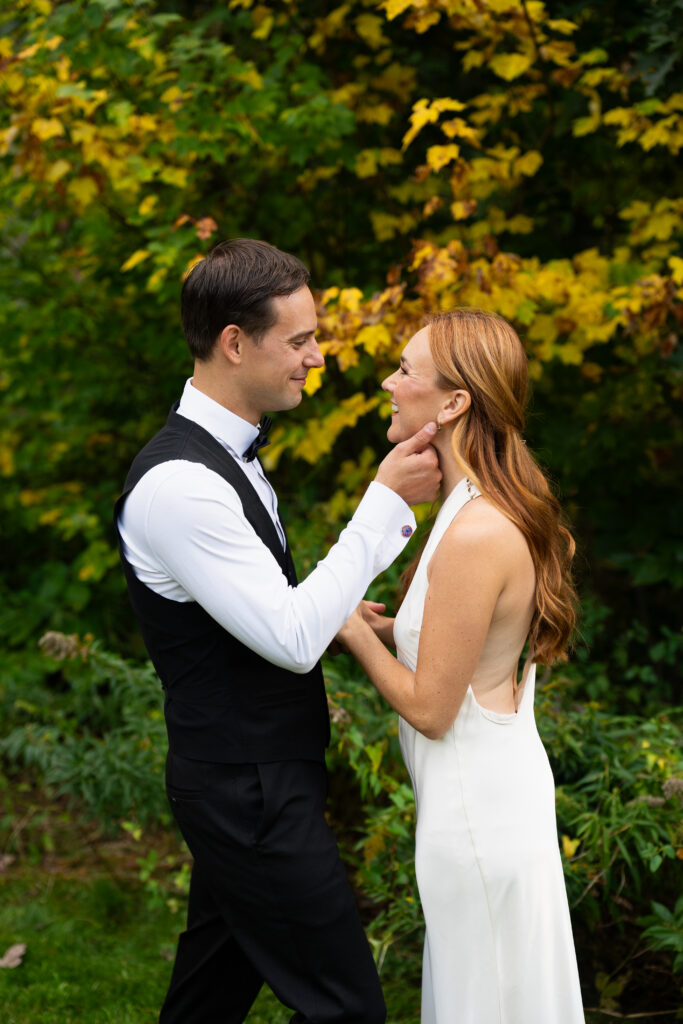 Couple eloping in backyard in maine during fall foliage: 4-8 week elopement planning 