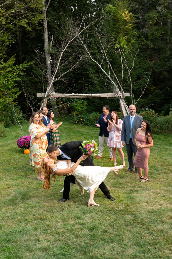 Groom dipping bride during Maine elopement ceremony 
how to elope in 4-8 weeks in Maine 